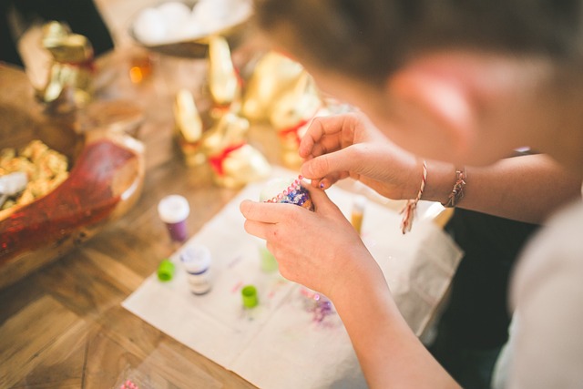 image of child working on a beading project